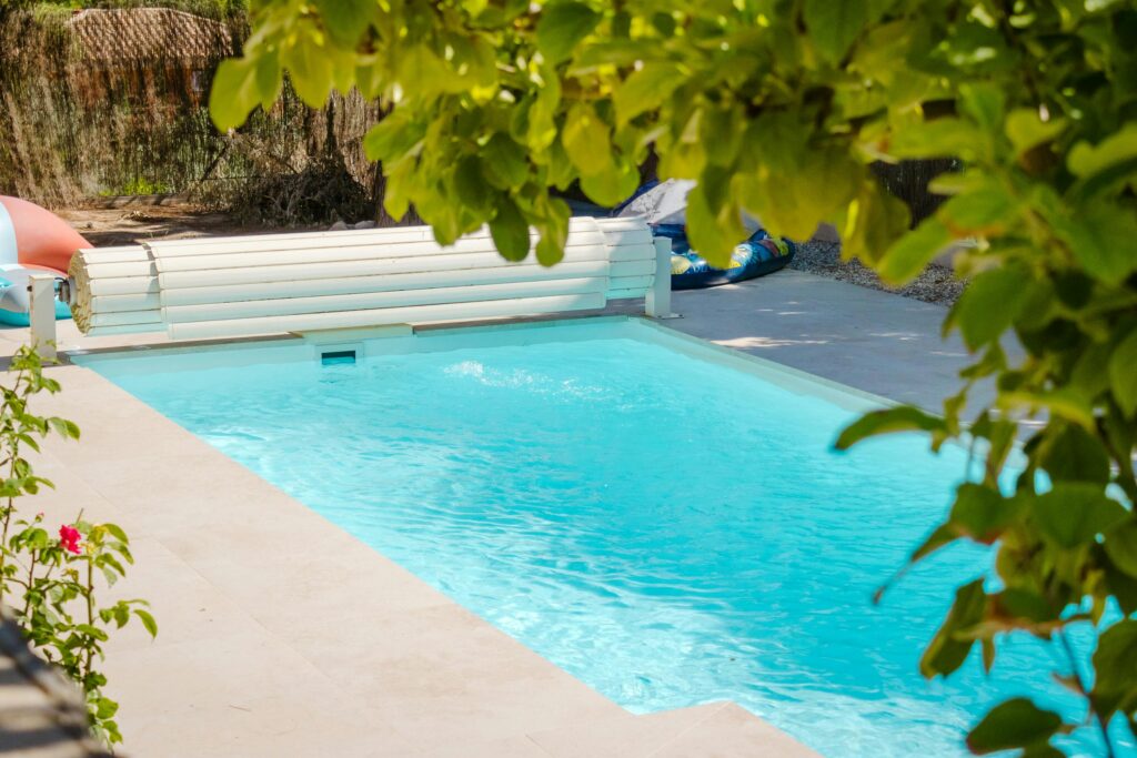 A serene Mediterranean pool scene perfect for summer relaxation and outdoor living.